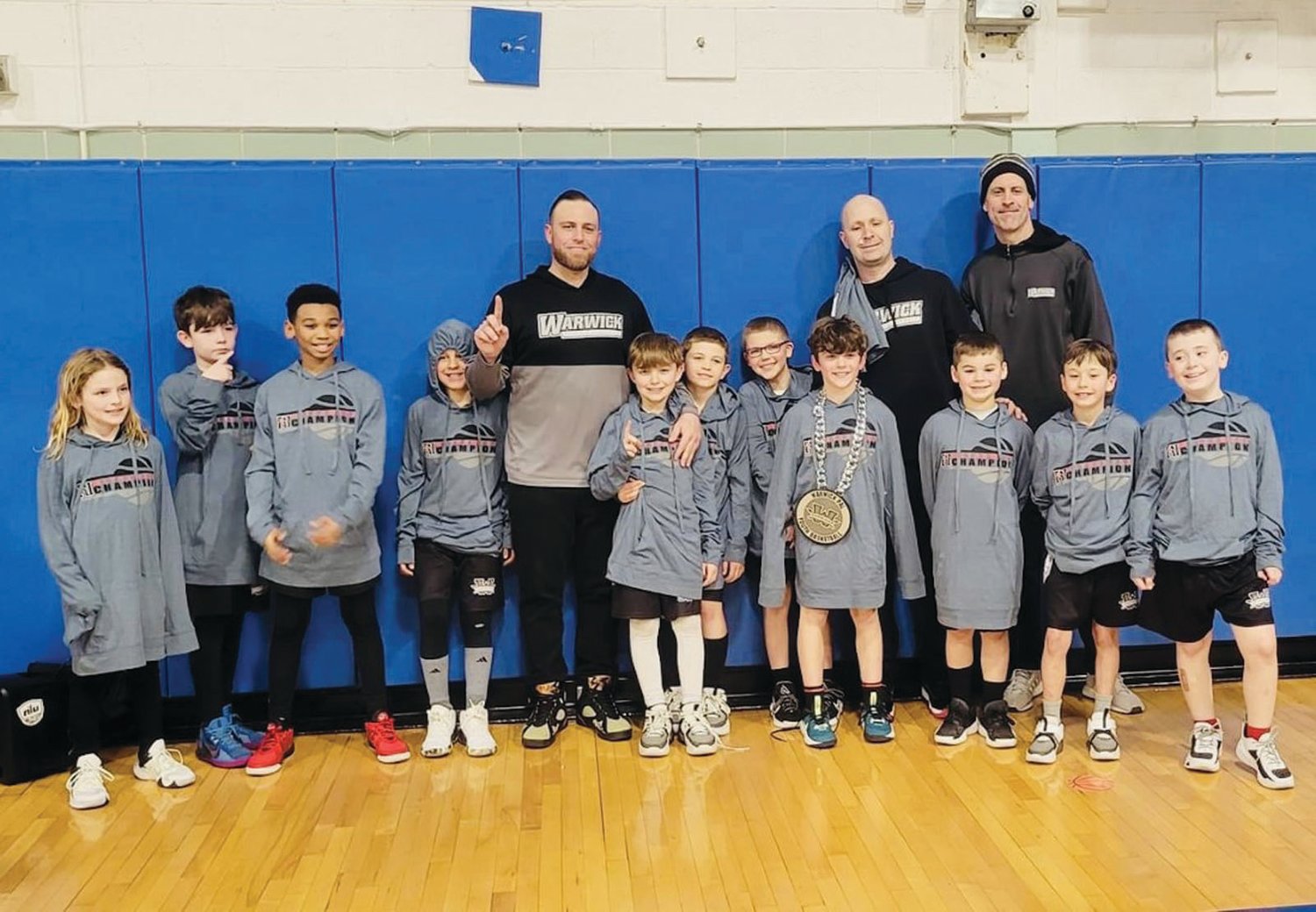 WARRIORS WIN: The PAL 3rd grade A team, which included from left to right: Max Jacob, Max Maloney, Tykem Weeks, Levi Narcavage, Asst. Coach Danny Silva, Danny Silva, Lou Johnston, Cody Banach, James Armstrong, Head Coach Jim Garcia, Harrison Belleville, Asst. Coach Dave Narcavage, Teddy Mackowitz, and Maximus Garcia.